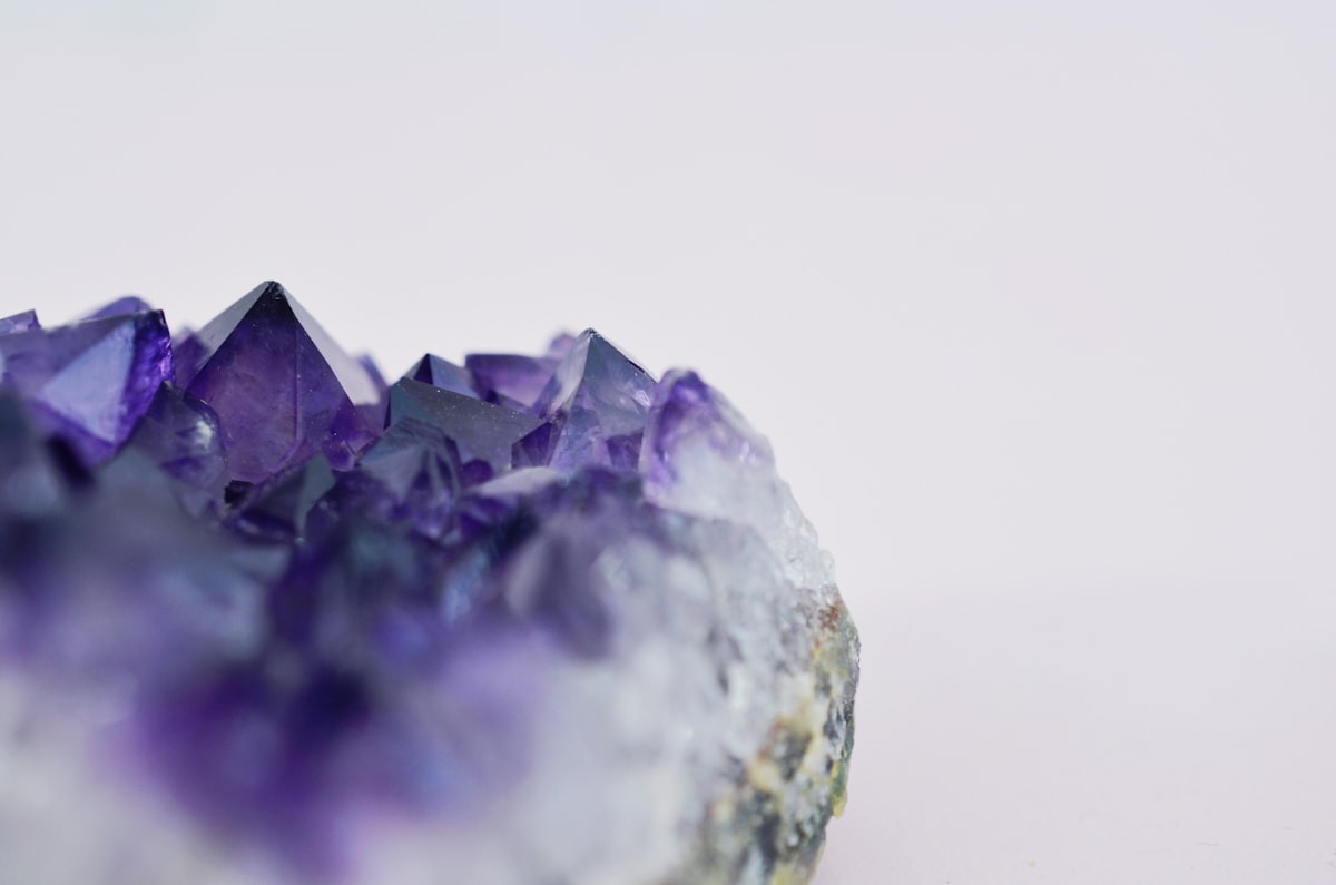An amethyst crystal cluster, formed by mineral-rich groundwater standing in a rock cavity