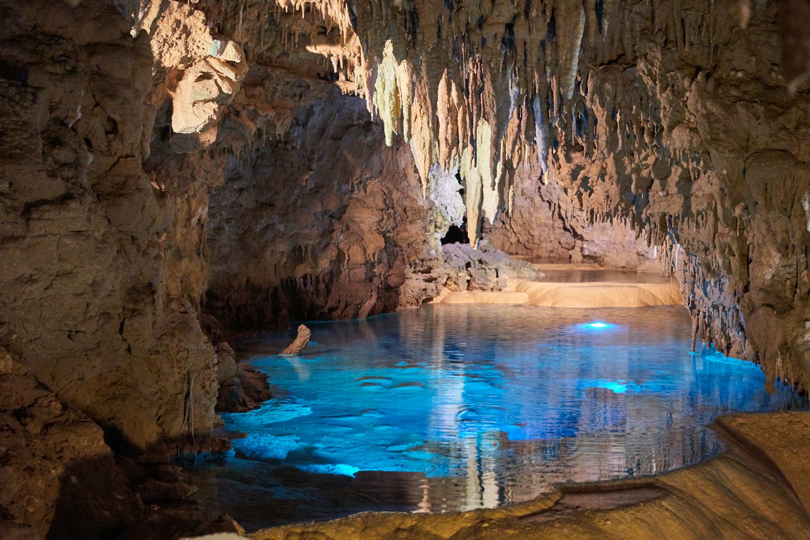 A flooded limestone cavern, the same kind of dissolved void that holds groundwater in dolomite country