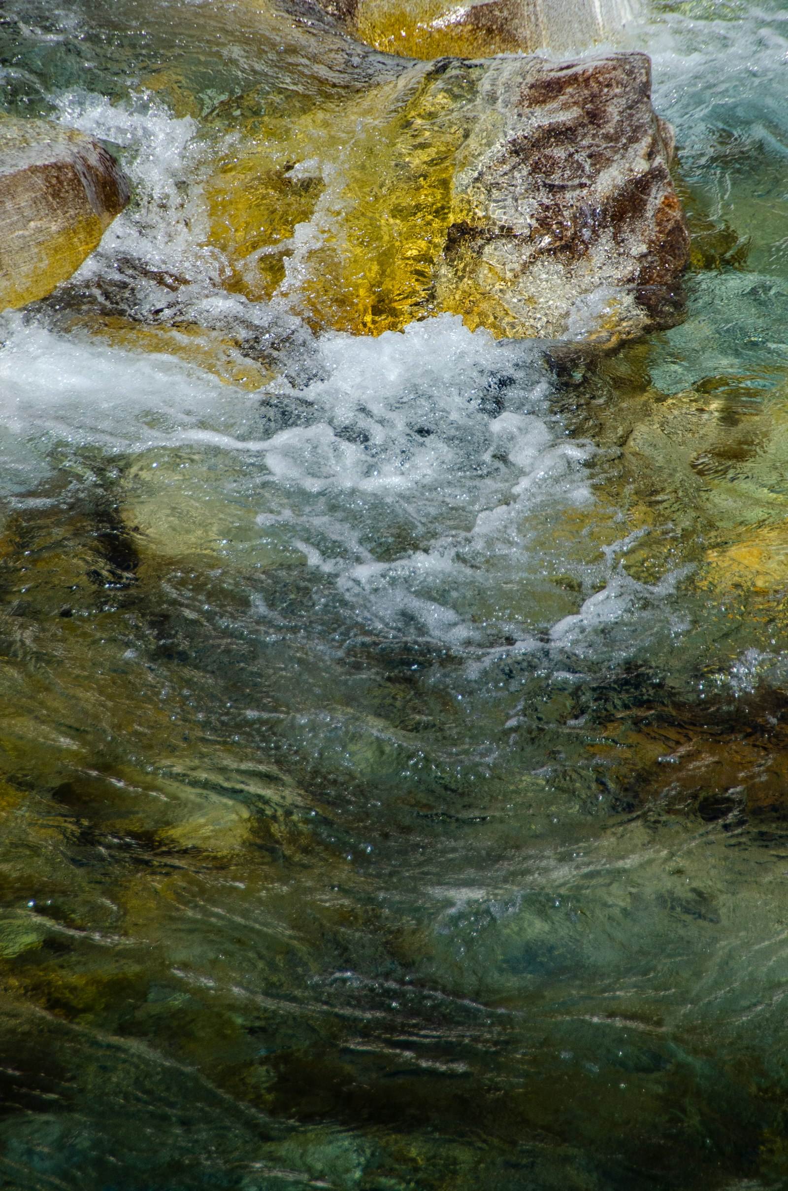 Clear water running over rock